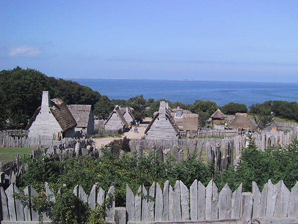 photograph of a real-life reproduction of a colonial settlement in Plymouth, Massachusetts